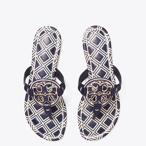 Tory Burch Miller Metal Logo Sandals in a black and white diamond geo print